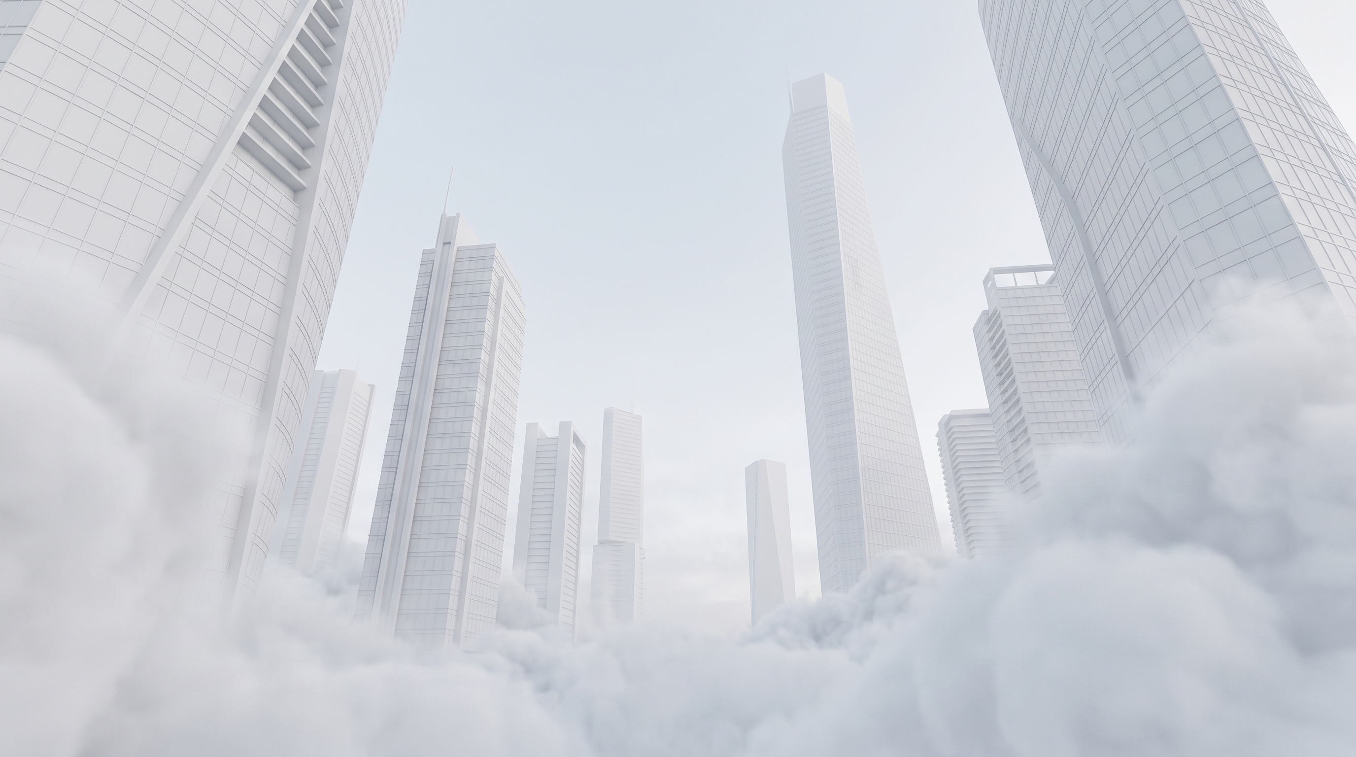 City skyline rising above the clouds
